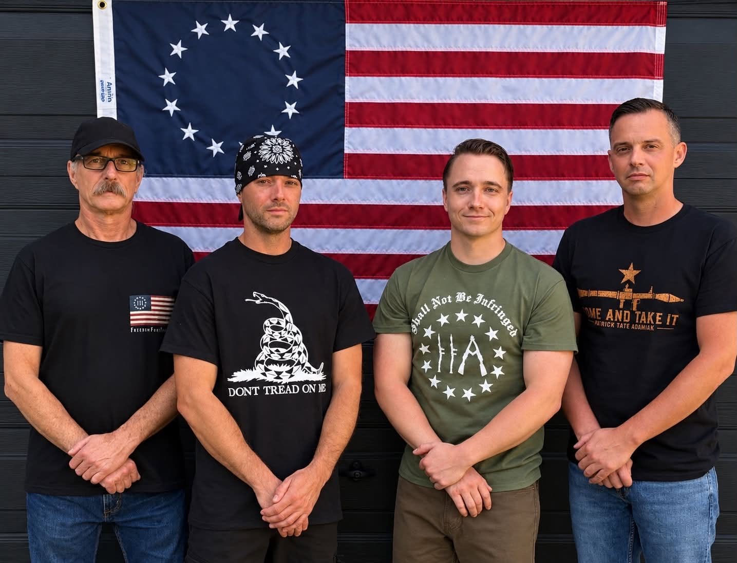 Patrick 'Tate' Adamiak, in the green shirt, standing with his family in front of an American flag